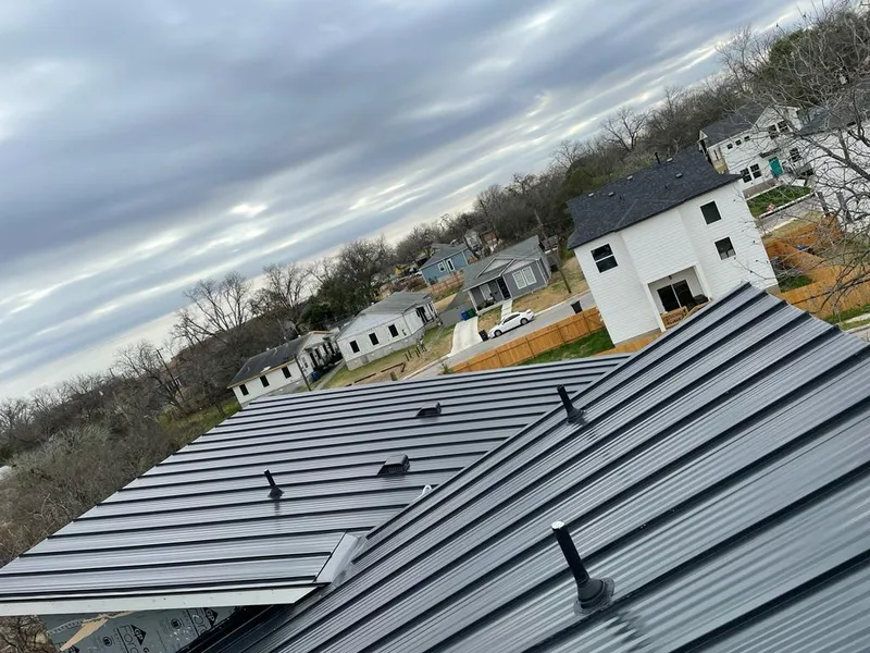 Standing seam metal roof panels with vents for Skylight Repair in Henrietta